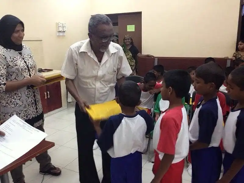 Administrating Officer, Murshid handing over the prizes
