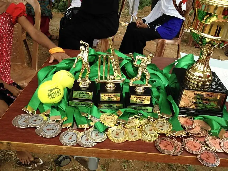 Best bowler, Best batsman and Man of the tournament trophies with individual medals
