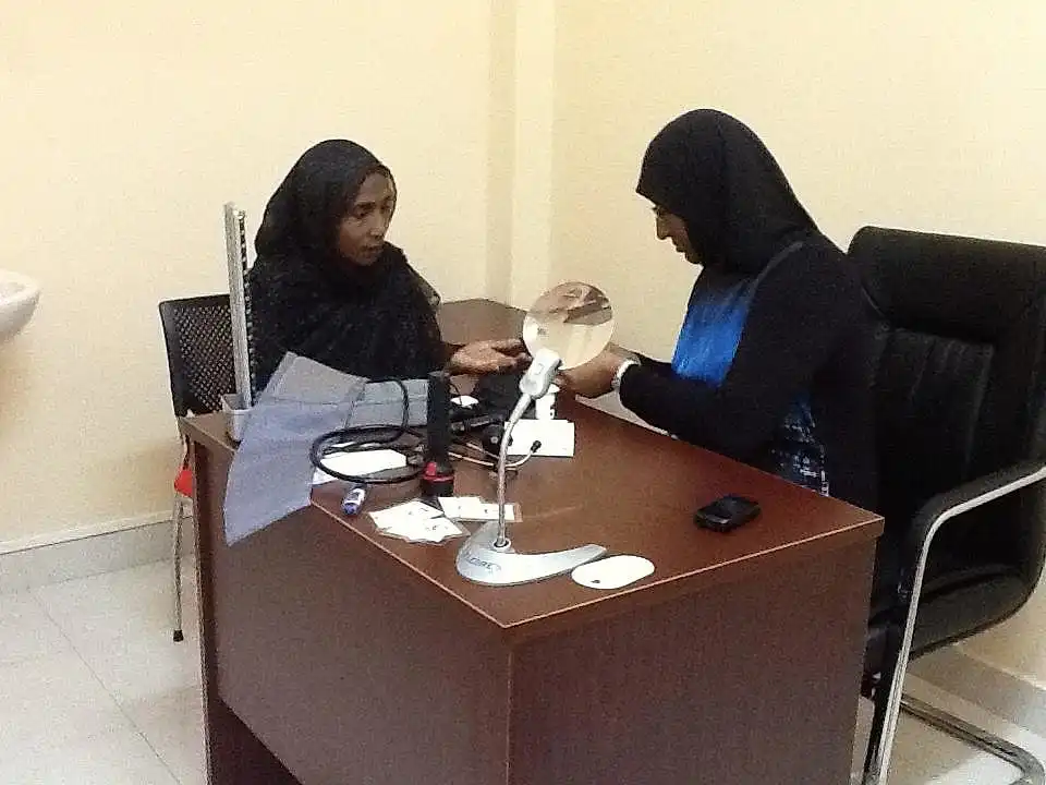 Patient being examined by MD