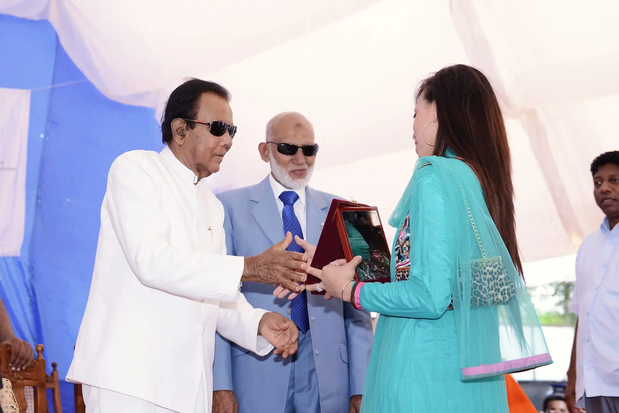 Memento presented on behalf of Dian Alyan of Give Light USA
